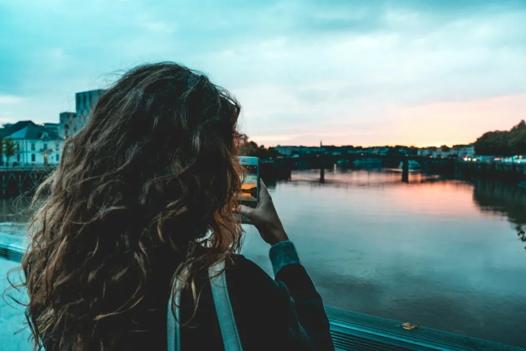 woman holding smartphone